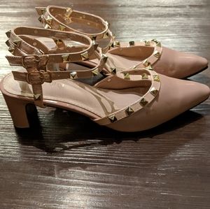 Nude/Blush pumps with gold spike accent